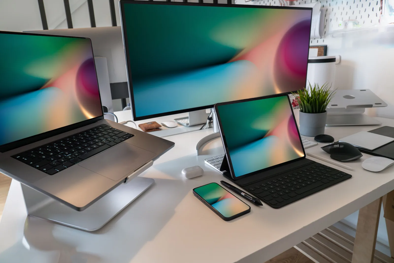 Laptop, desktop monitor, tablet and smartphone on a desk